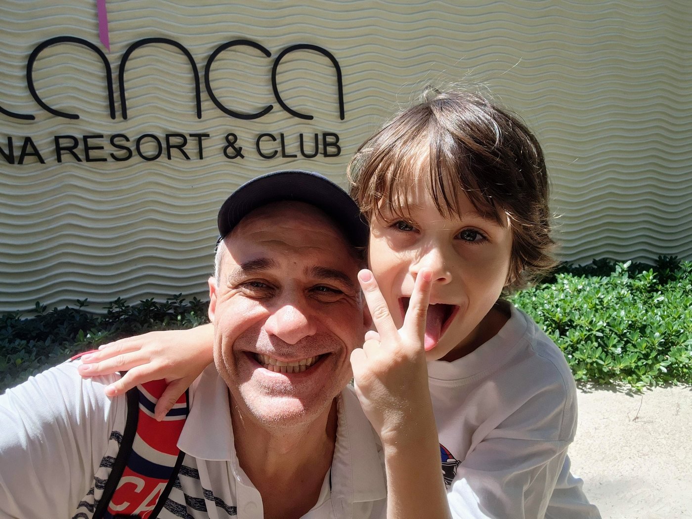 Scoy and his son outside a resort in Punta Cana